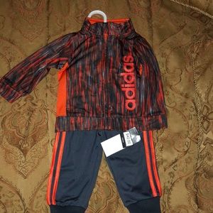 Adidas track suit size 9 months. New
